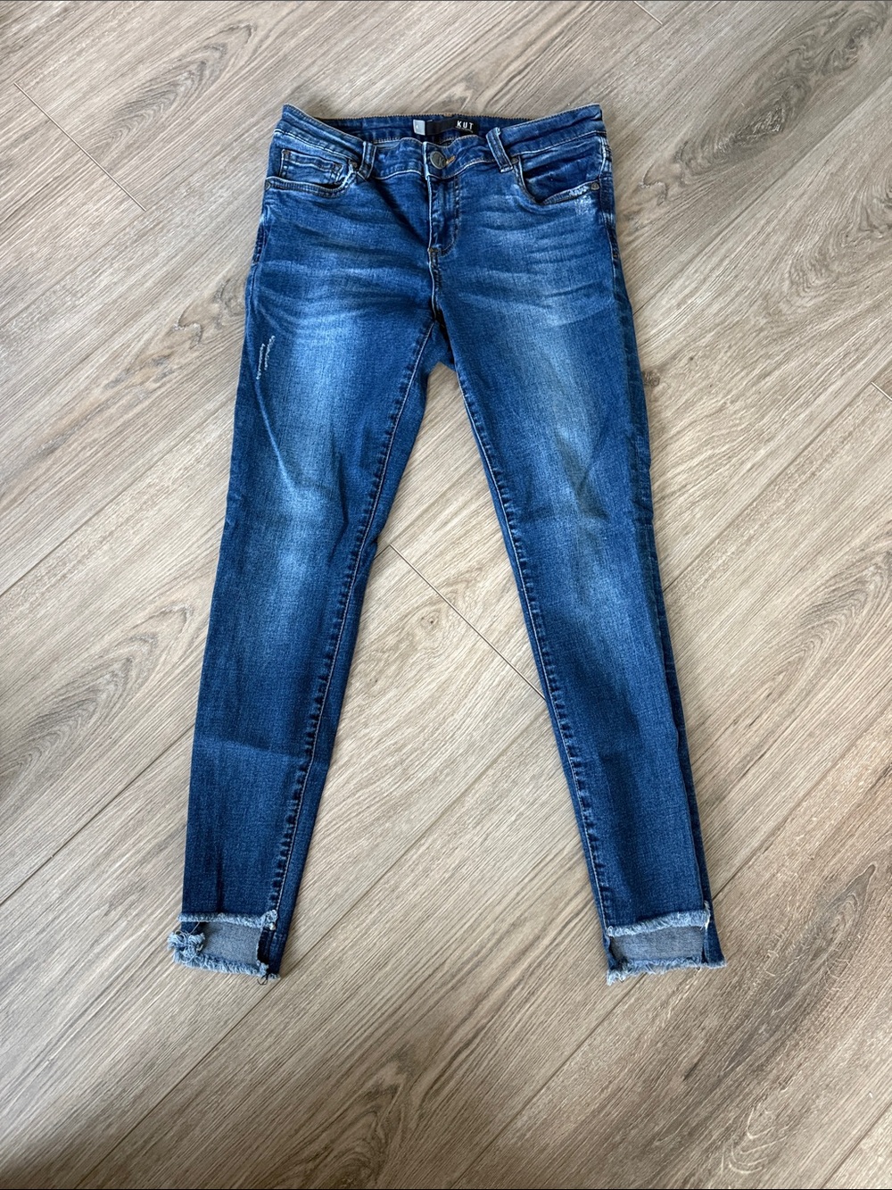 Kut from the Kloth “Connie” Medium Blue Ankle Straight w/ Fringed Step Hem Jeans